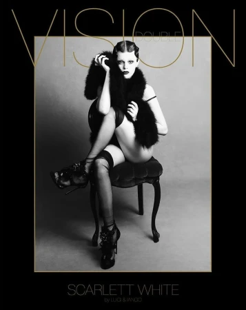 A woman in lingerie sits on a chair with black-and-white filter. She wears heels and a fur stole, while magazine text borders the shot.