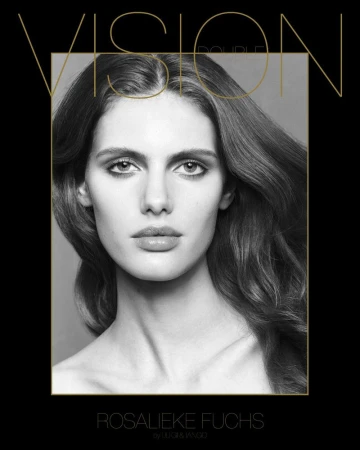 Portrait of a model with long dark hair and neutral expression against a plain background for Double Vision A/W 2025 Covers