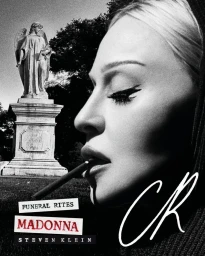 Close-up monochrome portrait of Madonna smoking a cigarette with a stone angel statue in the background for CR Fashion Book.