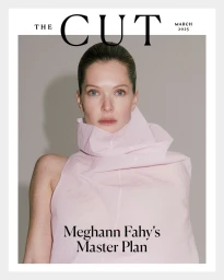 Meghann Fahy wearing a structured pale pink top against a neutral grey seamless background for The Cut March 2025 cover.