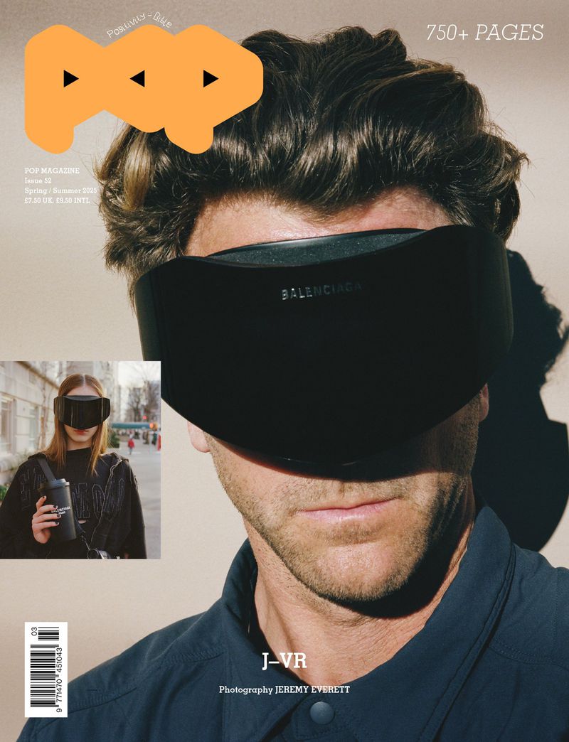 Fashion magazine cover featuring a portrait of a man with dark hair wearing Balenciaga VR glasses, with a smaller inset image.