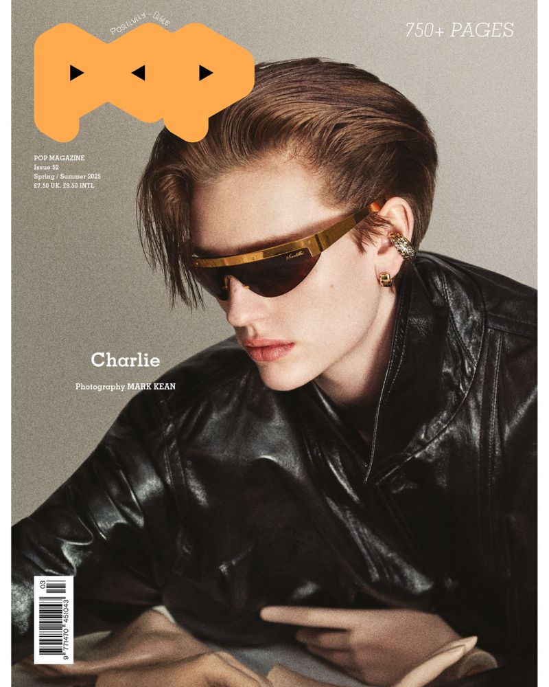 Model Charlie wearing dark wraparound sunglasses and a black leather jacket on Pop Magazine cover.