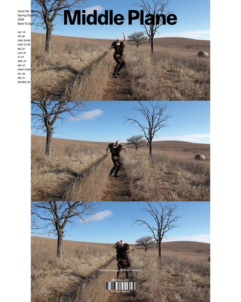 Magazine cover showcases a woman in motion across a grassy field under a blue sky, creating a dynamic and eye-catching visual composition.