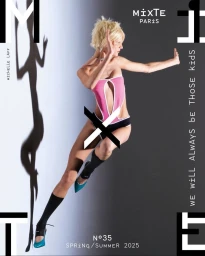 Model in pink and black cut-out bodysuit leaping against a grey and white studio background with graphic typography elements
