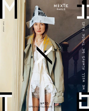 Model wearing newspaper hat and trench coat standing indoors with graphic text overlays for Mixte magazine