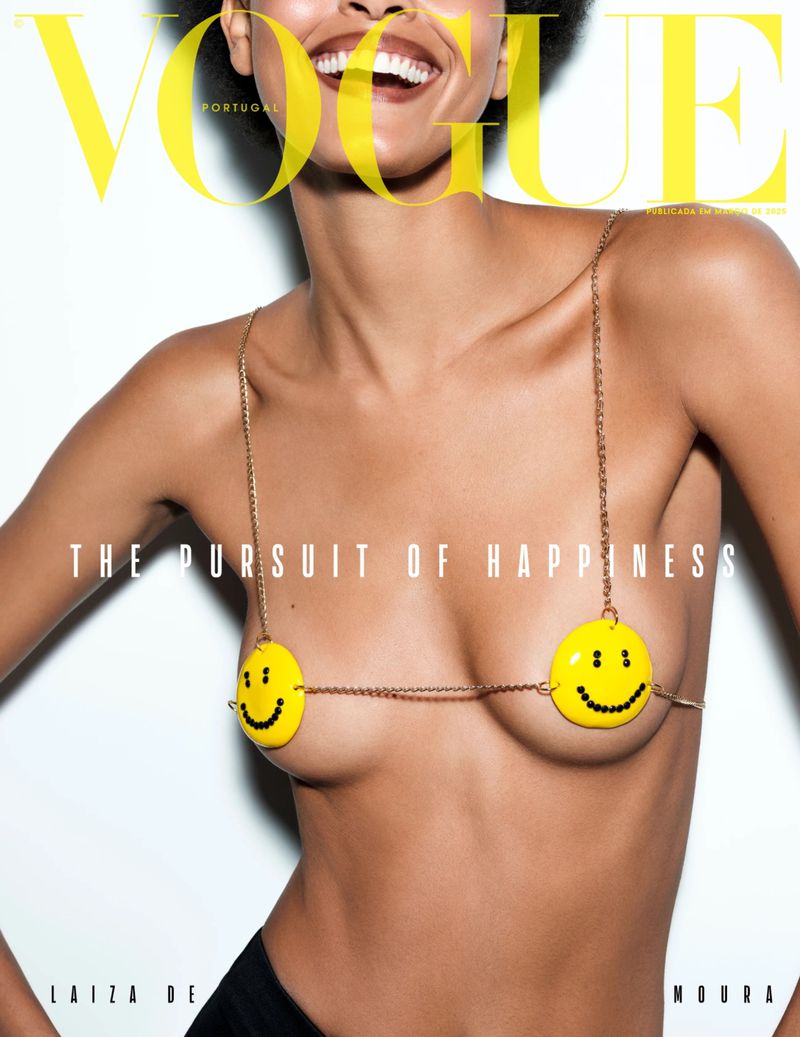 Vogue Portugal cover featuring an adult woman smiling, wearing a playful smiley-face bra top against a stark white backdrop with magazine text.