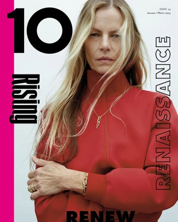 Model Emma Balfour wearing a red high-neck top with gold jewelry against a plain light background for 10 Magazine