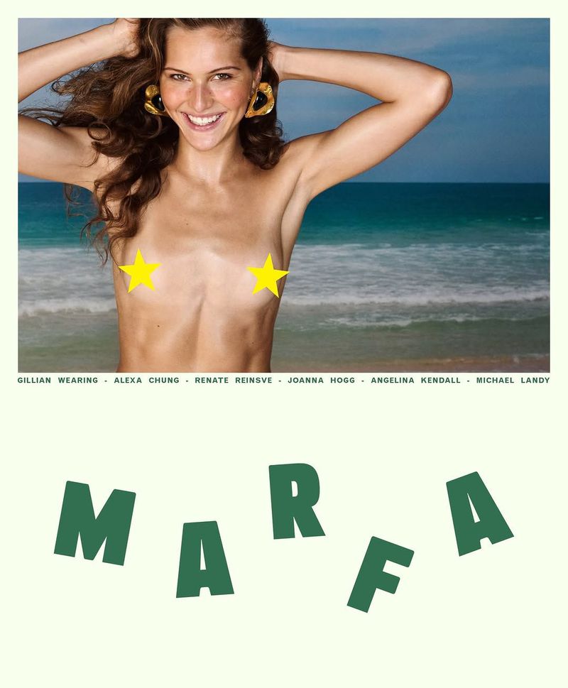 A woman smiles with her arms up in front of a turquoise ocean and blue sky, promoting the MARFA Film Festival.