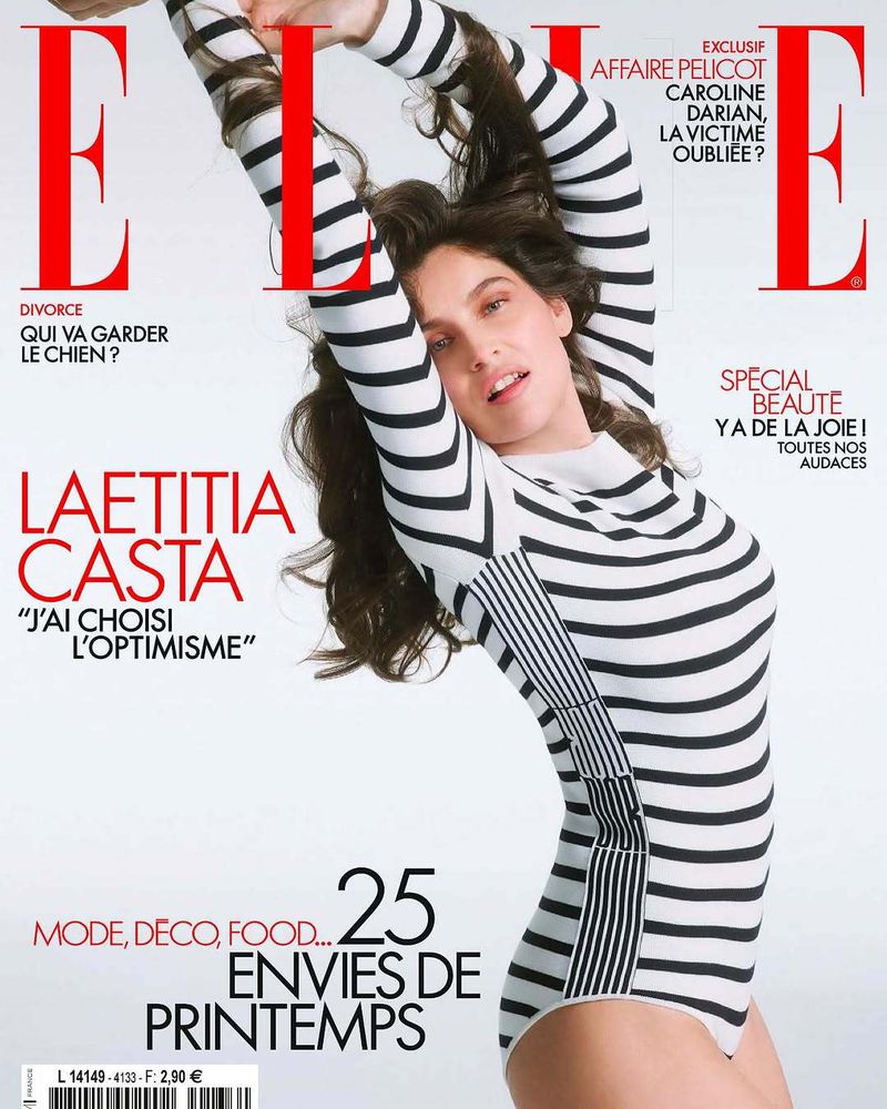 Elle magazine cover featuring Laetitia Casta in striped bodysuit, arms raised; fashion, beauty, editorial photography, French text.