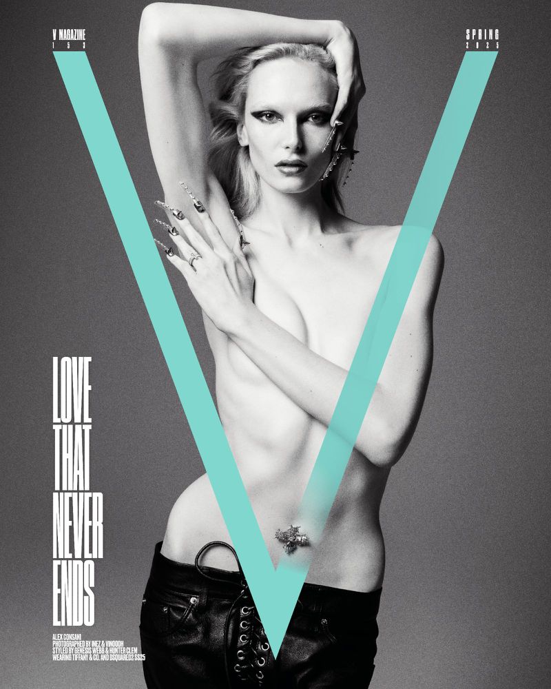Monochrome fashion magazine cover featuring a fair-skinned woman with unique makeup and long nails, wearing dark pants.