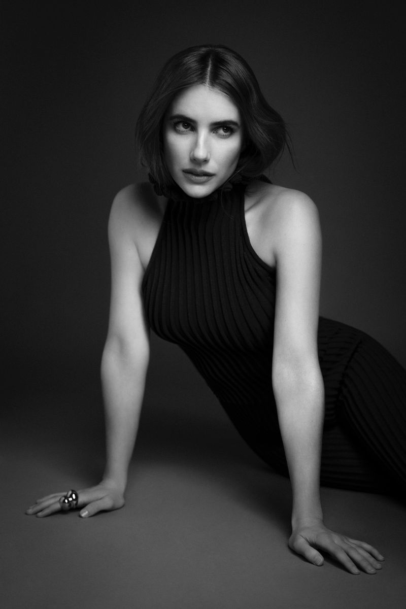 Emma Roberts posing in a black ribbed halter top for Harper's Bazaar Espana captured by photographer JuanKr
