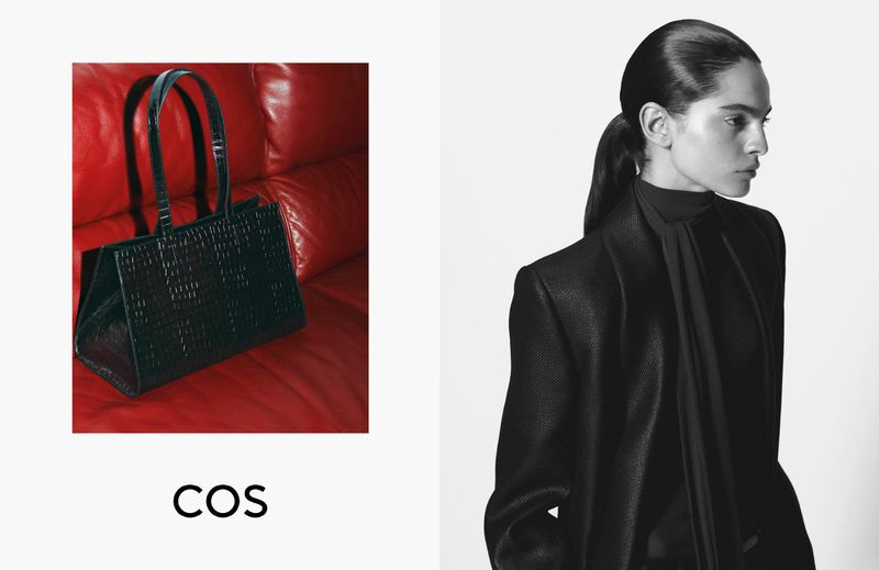 COS campaign layout featuring a black embossed tote bag on a red leather sofa beside a model in a black tailored suit.