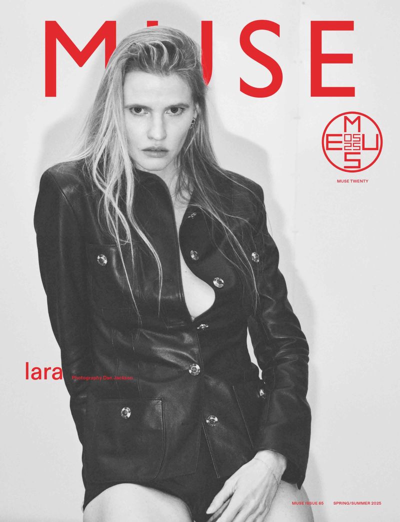 Magazine cover shot of adult female model wearing a black leather jacket; studio setting with red "Muse" text logo in the background.