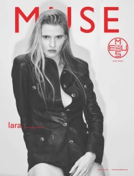 Model Lara Stone wearing a black leather jacket against a white seamless background for Muse Magazine cover