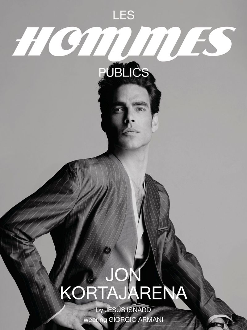Black and white portrait of Jon Kortajarena wearing a pinstripe suit, featured on the cover of Les Hommes Publics.