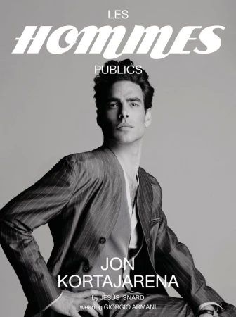 Black and white portrait of Jon Kortajarena wearing a pinstripe suit, featured on the cover of Les Hommes Publics.