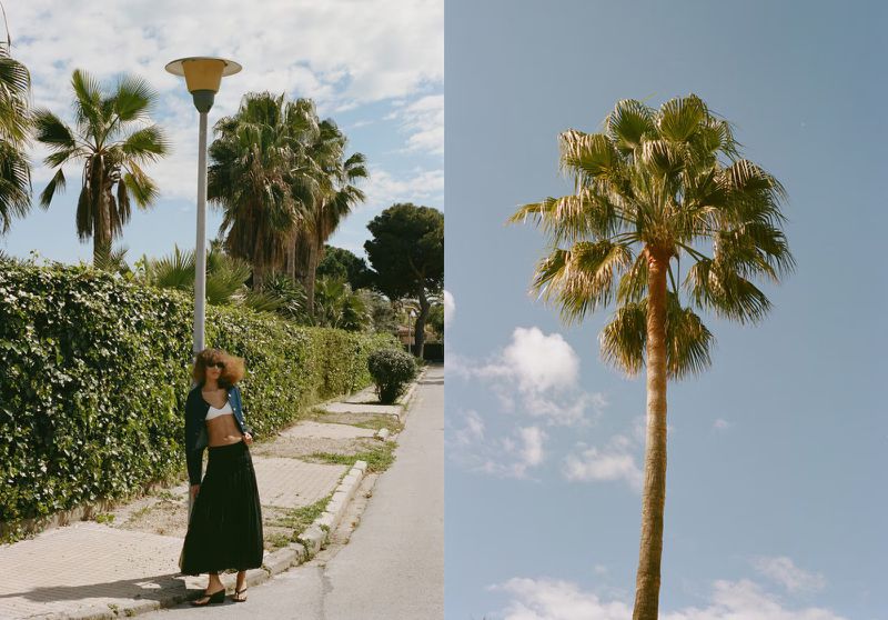 Woman in skirt stands on pathway framed by palm trees and lush greenery under a blue sky, split-screen with a single palm tree.