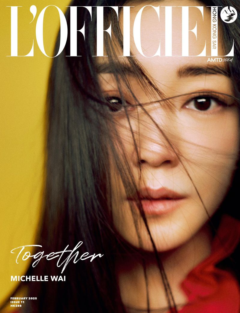 Close-up portrait of Michelle Wai with dark hair across her face against a bright yellow background for L'Officiel Hong Kong magazine cover