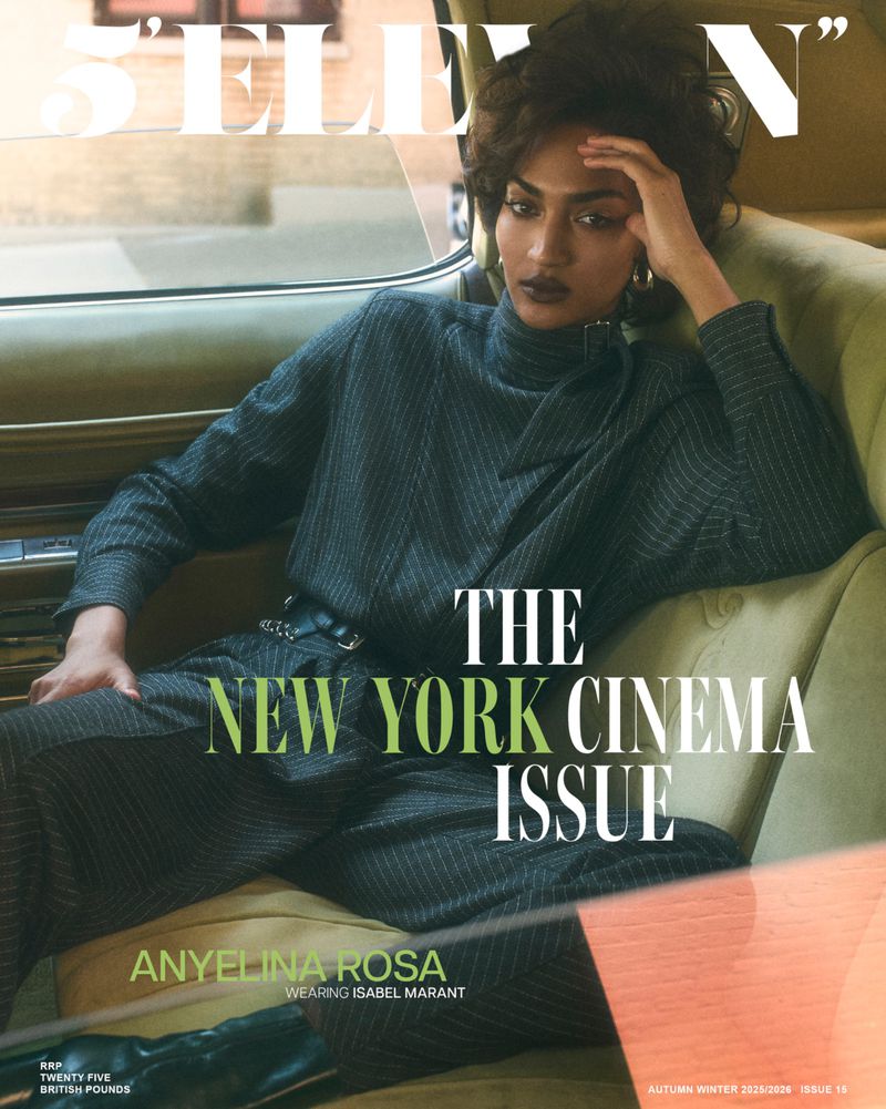 Magazine cover featuring a woman in a gray pant suit sitting inside a car, with bold text overlay and cinematic theme.