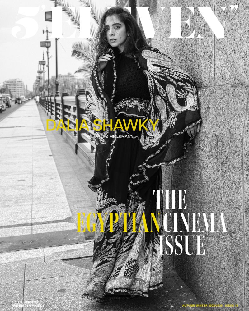 Magazine cover featuring Dalia Shawky in a black and white aesthetic, highlighting fashion and editorial style against an urban setting.