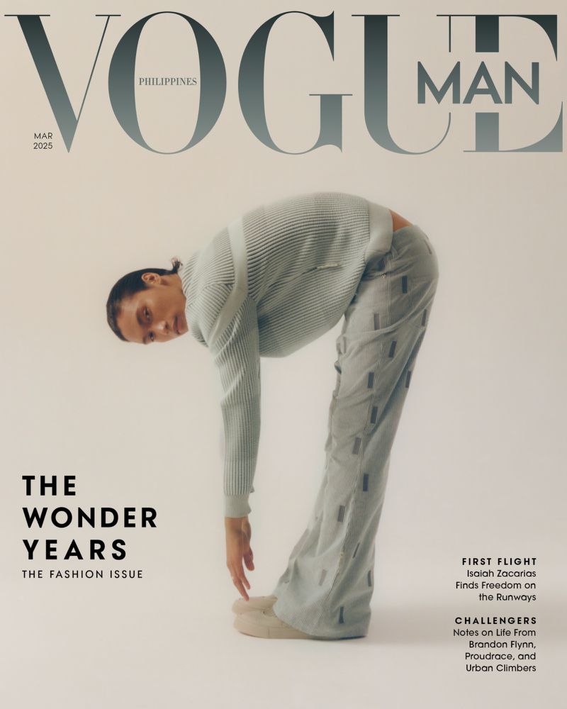 Vogue Man Philippines cover featuring a male model bending over, wearing a striped top and patterned trousers, against a neutral backdrop.