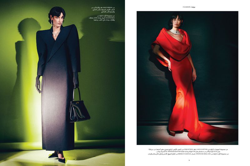 Two women model contrasting fashion looks in a studio setting: a long black dress with a purse and a draped red gown.