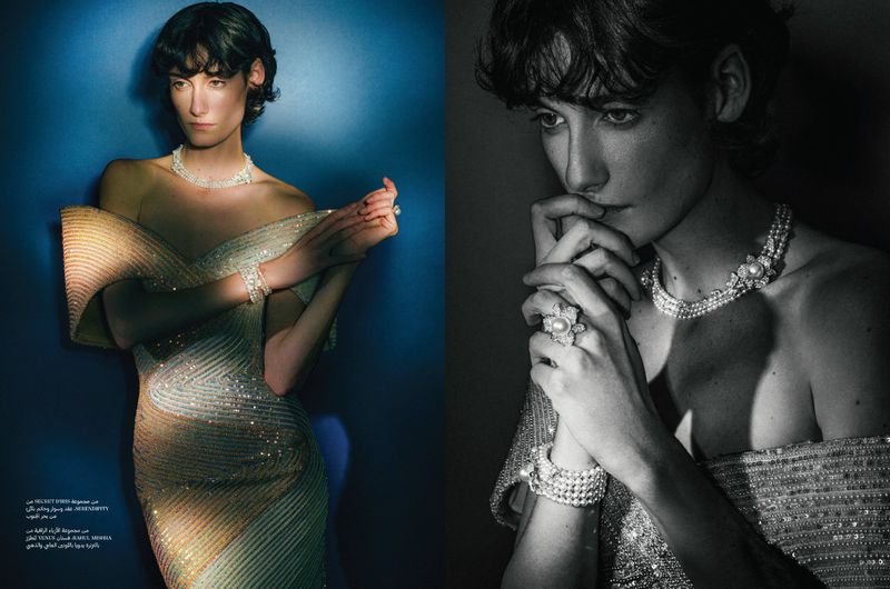 Fashion editorial shot of a model wearing a shimmering gown and pearl jewelry, with a studio setting using contrasting lighting.