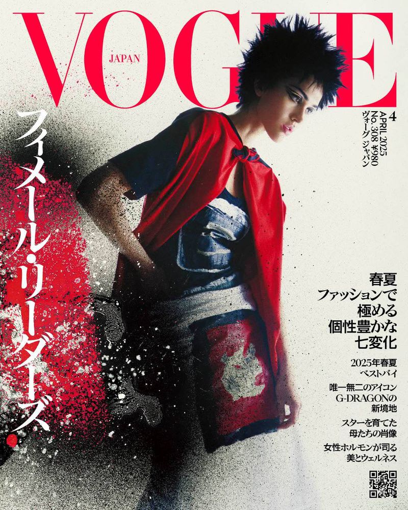 Vogue Japan cover featuring a model in a red cape and distressed clothing, with vibrant colors and a blend of photographic and artistic elements.