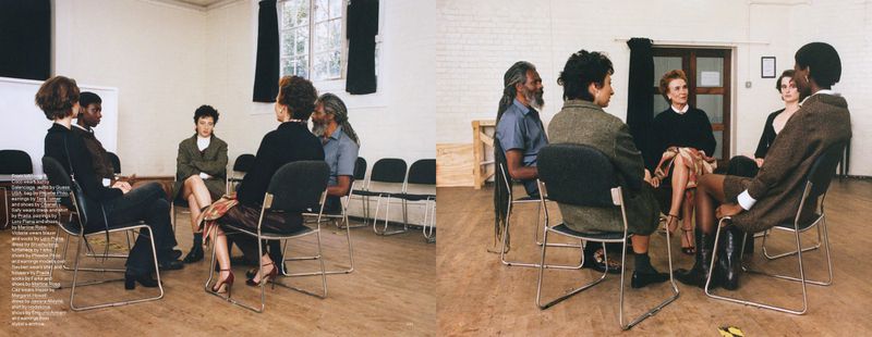 Group of adults in indoor setting, seated in a circle for meeting or discussion, wearing diverse attire, photo studio setting.