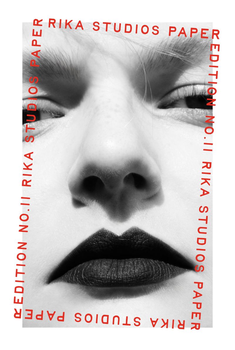 Black and white close-up studio portrait of a woman with a dramatic expression framed by red text in a minimalist style.