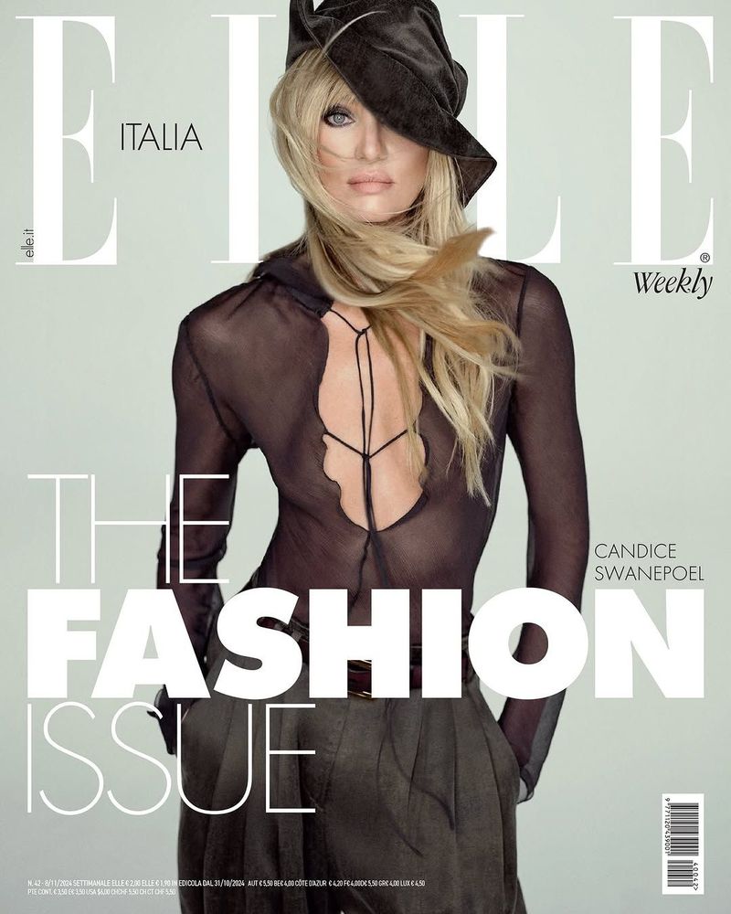 Magazine cover featuring a blonde woman in a sheer black top and hat, with “ELLE ITALIA” and “THE FASHION ISSUE” text overlays.