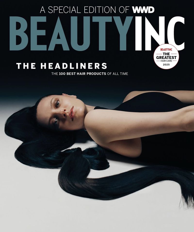 Magazine cover featuring a woman with long, dark hair lying down, promoting beauty and hair care, with 'Beauty Inc' as the dominant text.