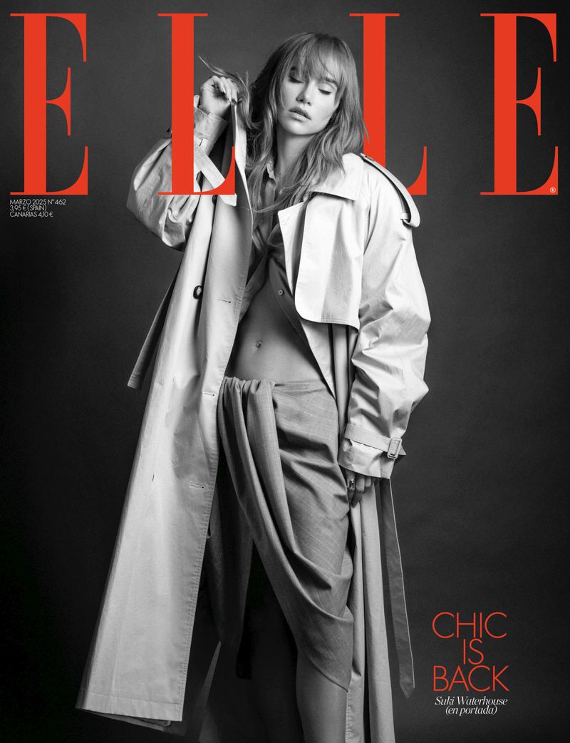 Elle magazine cover featuring a woman with blonde hair wearing a trench coat, with the magazine title in large red letters.