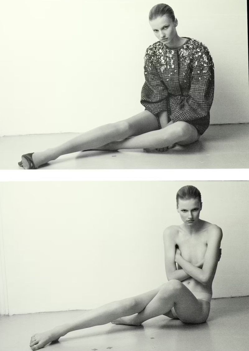 Black and white fashion portrait of a woman in an embellished blouse and a nude woman sitting on the floor against a white background.
