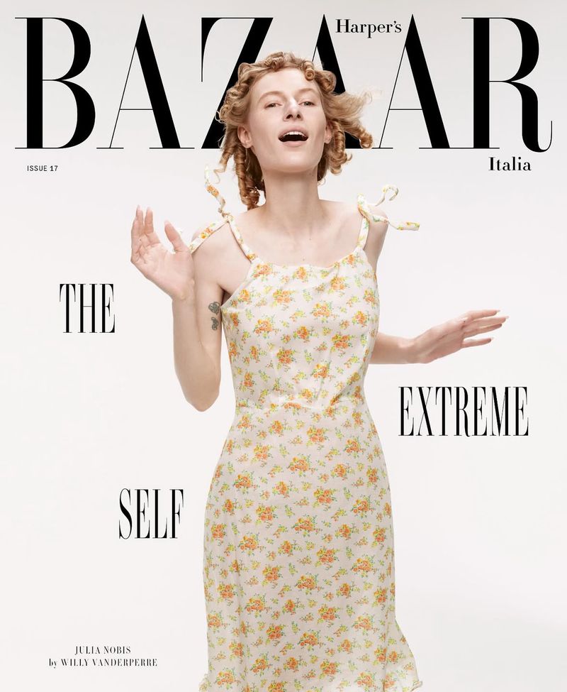 Harper's Bazaar Italia magazine cover featuring a fair-skinned woman in a floral dress against a white background with bold magazine text.