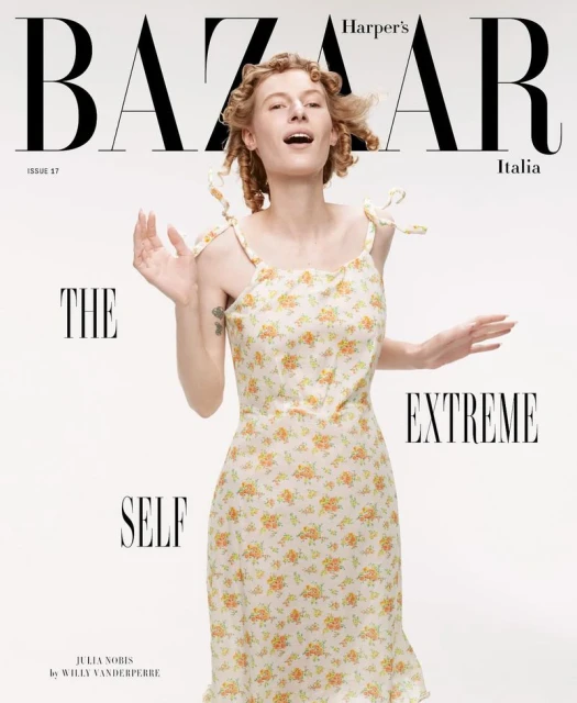 Harper's Bazaar Italia magazine cover featuring a fair-skinned woman in a floral dress against a white background with bold magazine text.