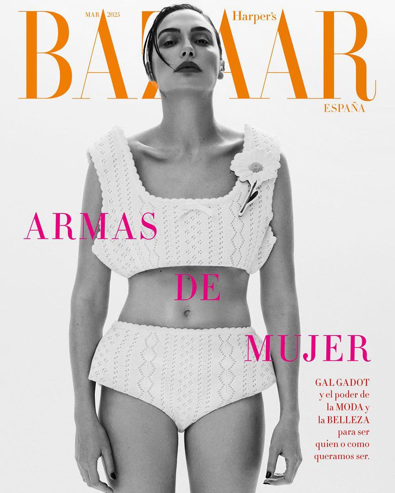 Harper's Bazaar Espana cover featuring Gal Gadot in a white knit outfit against a white background, with orange masthead and pink text.