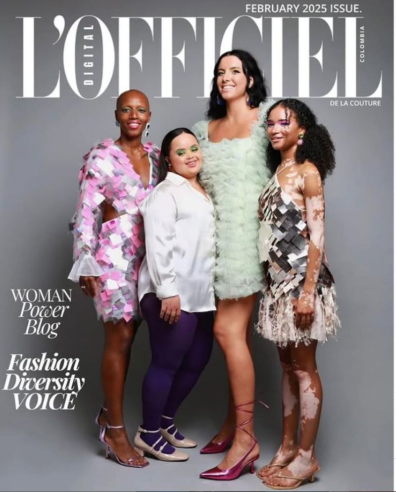 L'Officiel cover featuring four diverse women in stylish dresses and heels against a grey backdrop; fashion, beauty, and diversity themes.