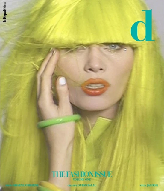 Fashion magazine cover featuring a woman with neon yellow hair and orange lipstick, accessorized with green bracelets and a neon top.