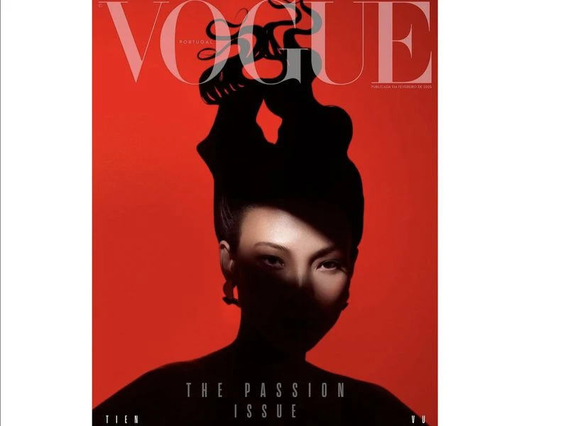 Vogue Portugal magazine cover featuring a silhouetted woman against a vibrant red background with bold typography and dramatic lighting.