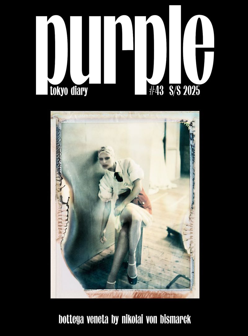 Magazine cover featuring a woman in a vintage-style dress sitting indoors, with large purple title text and Bottega Veneta credit.