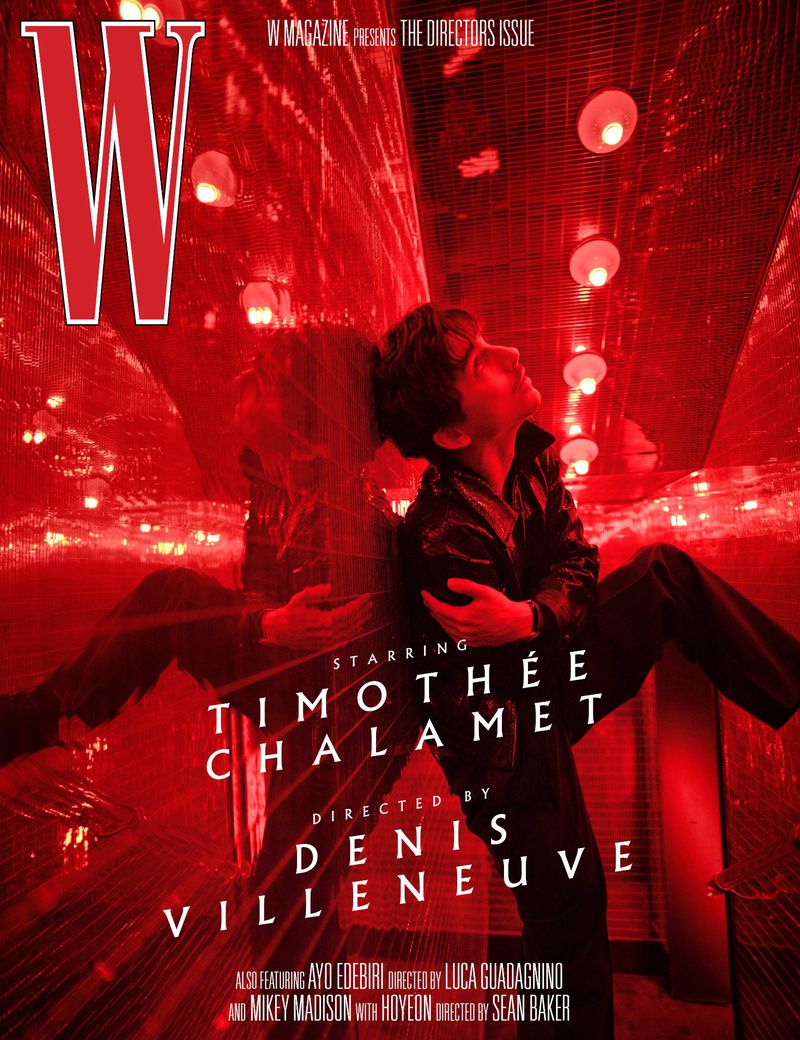 Magazine cover featuring Timothée Chalamet in a red-lit disco setting for W Magazine's The Directors Issue, showcasing his reflection.