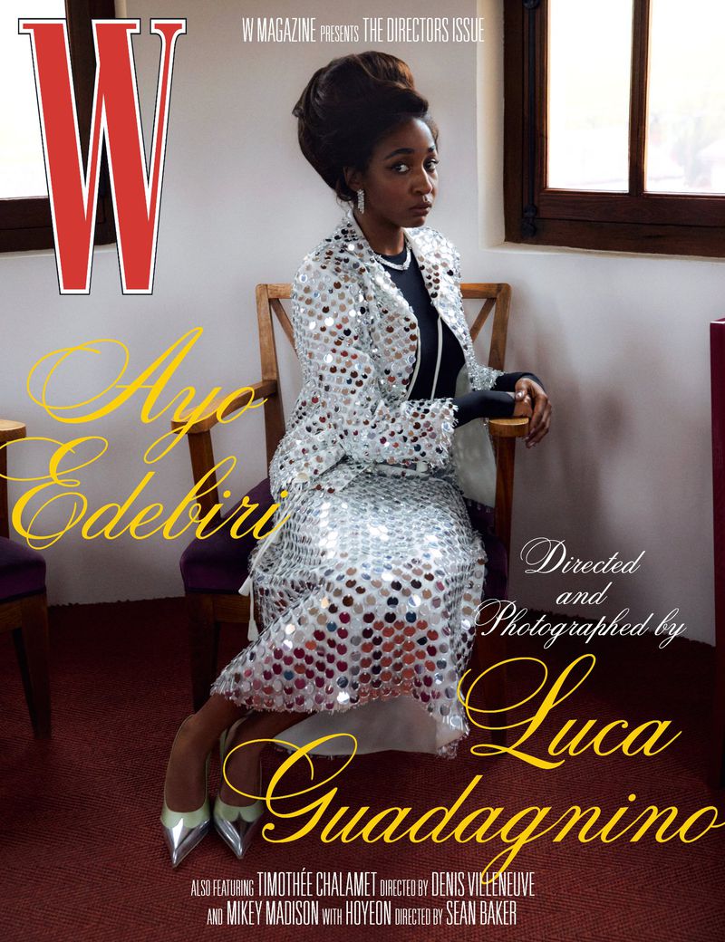 Ayo Edebiri sits in silver sequin dress in front of window for 'W Magazine' cover shoot by Luca Guadagnino. Features Timothée Chalamet.