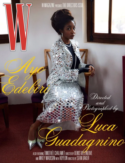Ayo Edebiri sits in silver sequin dress in front of window for 'W Magazine' cover shoot by Luca Guadagnino. Features Timothée Chalamet.