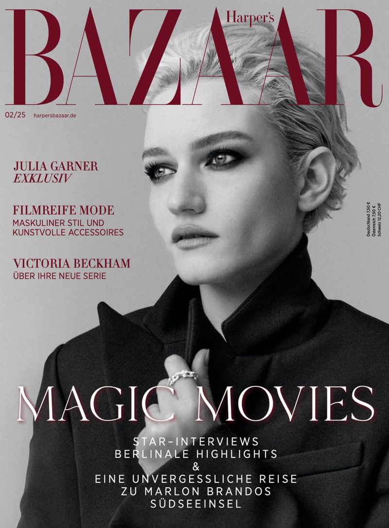 Magazine cover featuring Julia Garner in Harper's Bazaar. Close-up shot of the actress wearing a black jacket against a gray backdrop.