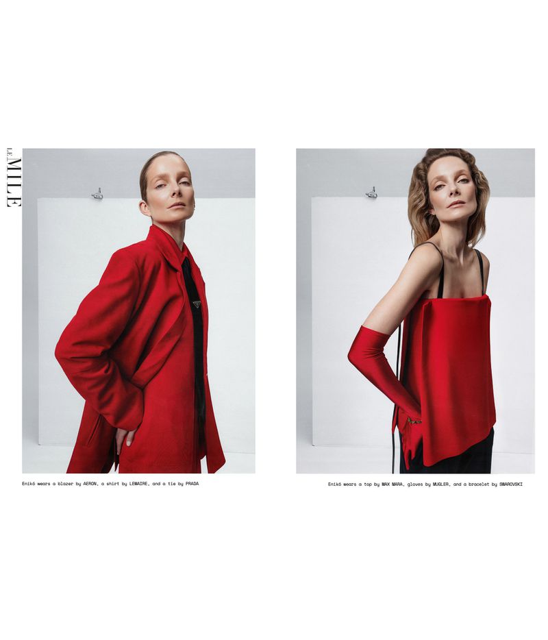 Model Eniko Mihalik wearing a vibrant red blazer and red top in a fashion editorial for Le Mile Magazine by Oleg Borisuk.