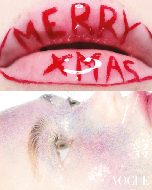 Macro beauty shot of a woman's face with lips painted with 'Merry Xmas' and glitter makeup on her cheek and eye, studio lighting.