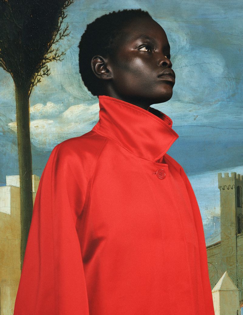 Dark-skinned woman in a red coat against a painterly backdrop of a blue sky, tree, and castle evoking a vintage aesthetic.