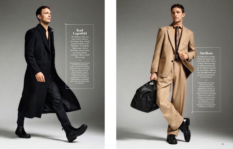 Men's fashion editorial featuring two male models in tailored suits and coats, showcasing different styles against a neutral grey backdrop.