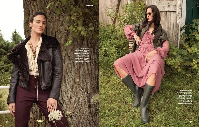 Editorial fashion spread featuring a woman posing by a tree wearing a jacket and pants, and another woman seated in a dress and boots outdoors.